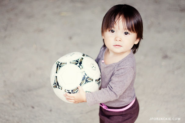 Julienne playing soccer at the park